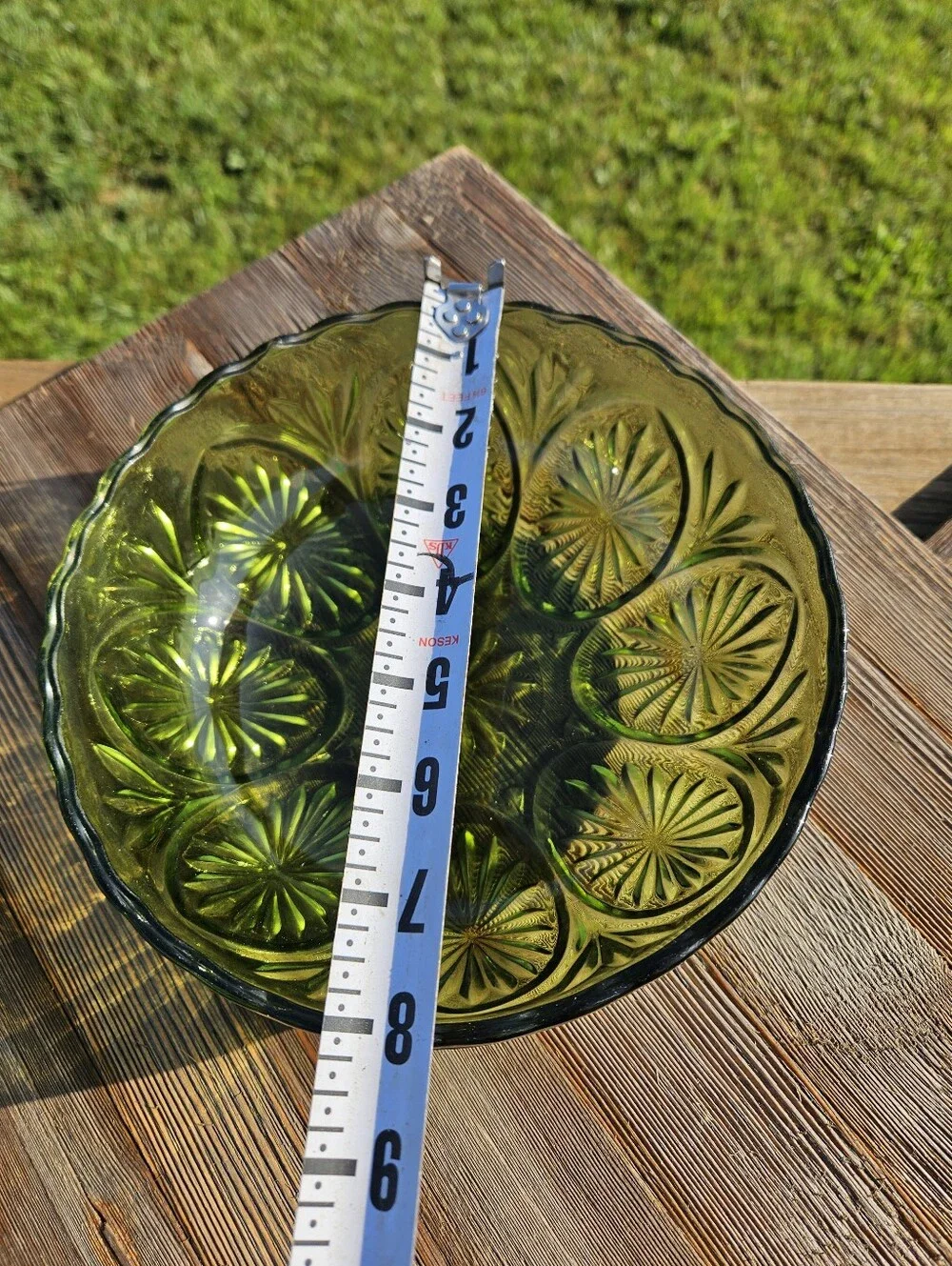 Green glass bowl with starburst pattern  #starburst